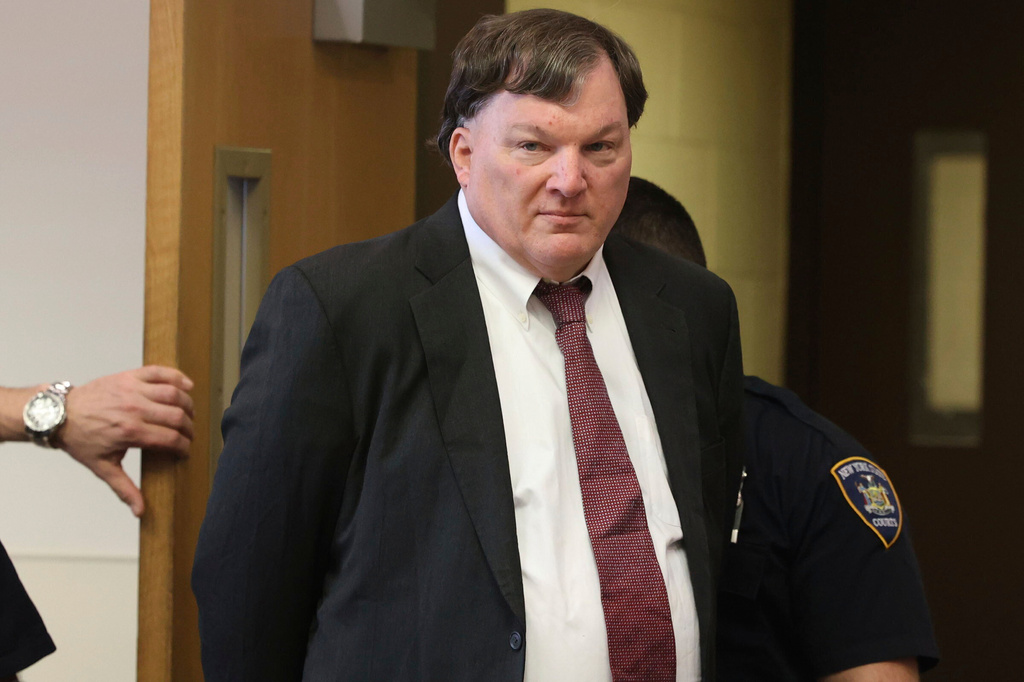 Rex Heuermann, charged in a string of deaths known as the Gilgo Beach killings, appears in Judge Timothy Mazzei's courtroom at Suffolk County Court in Riverhead, N.Y., for a status conference on Feb. 25, 2025.