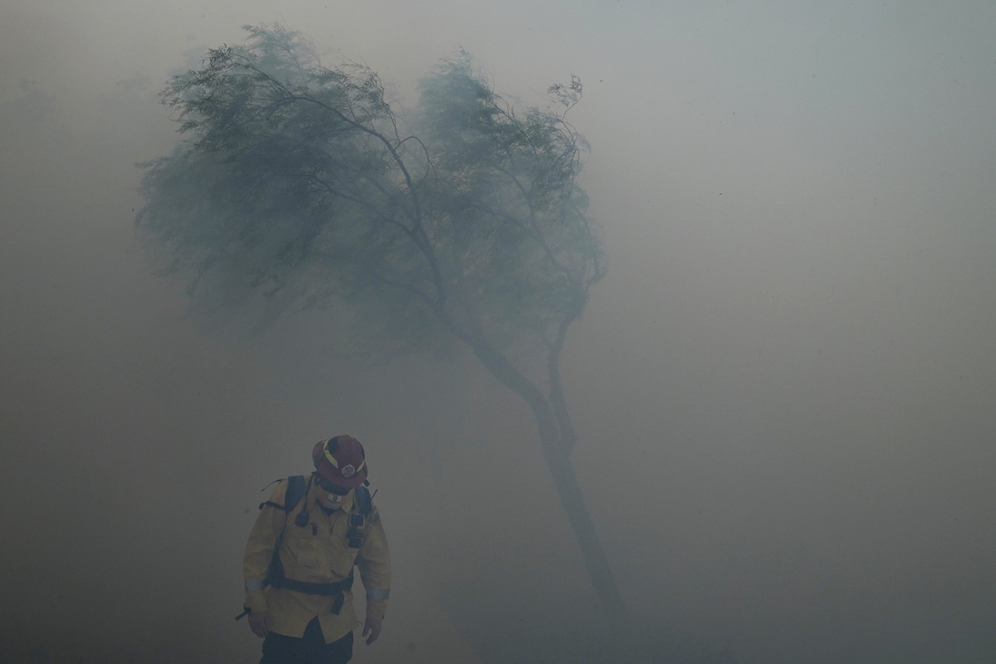 60,000 in Southern California to evacuate after blaze grows