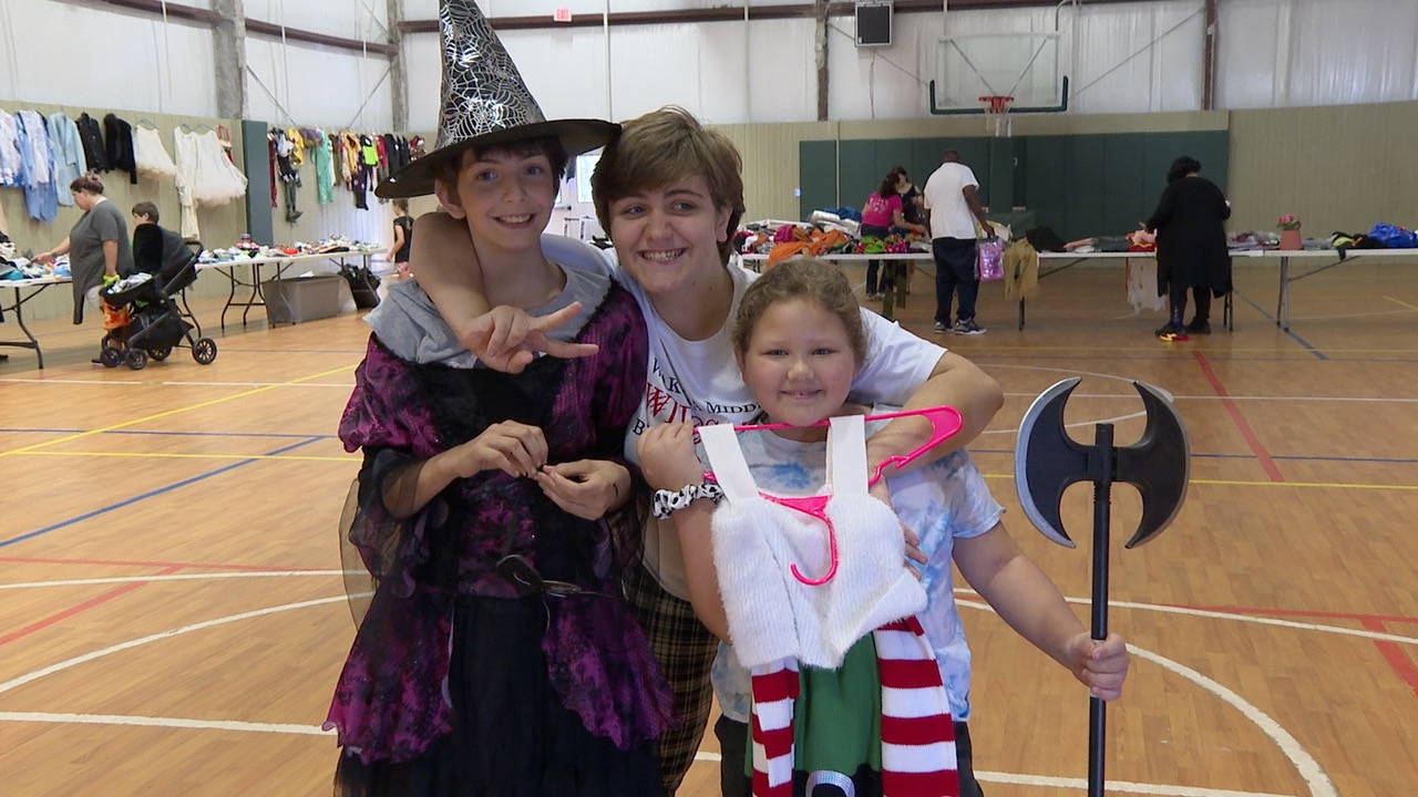 The Metzlers with their Halloween costumes