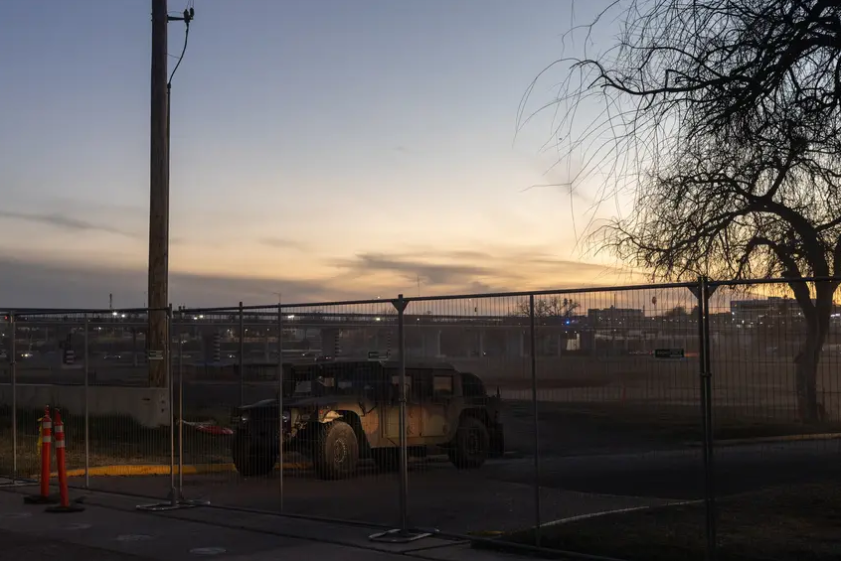 A Texas National Guard Humvee parked at the gates of Shelby Park, in Eagle Pass, on Jan. 16, 2024. Texas closed off Shelby Park, limiting access to federal agents to part of the Texas-Mexico border and escalating tensions between the Biden administration and Gov. Greg Abbott.