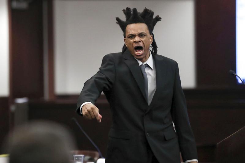 'You stabbed me,' boy tells father at double-murder trial