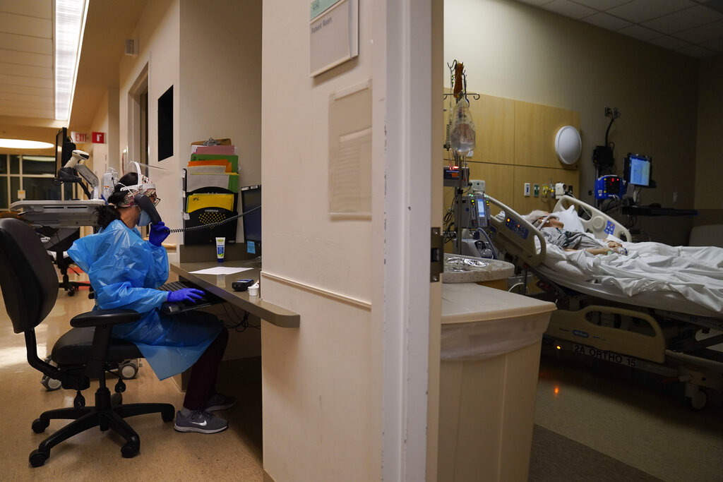 Virus Outbreak-US Surge