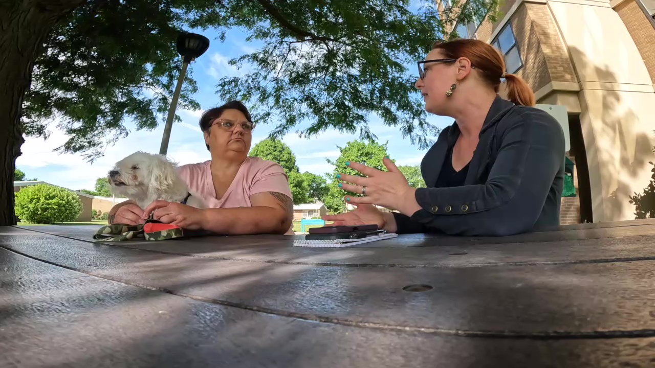 Charlene Elder, left, has been a victim of SNAP benefits theft. She and News 5 reporter Michelle Jarboe talk about the Ohio General Assembly's move to require security chips on new EBT cards.