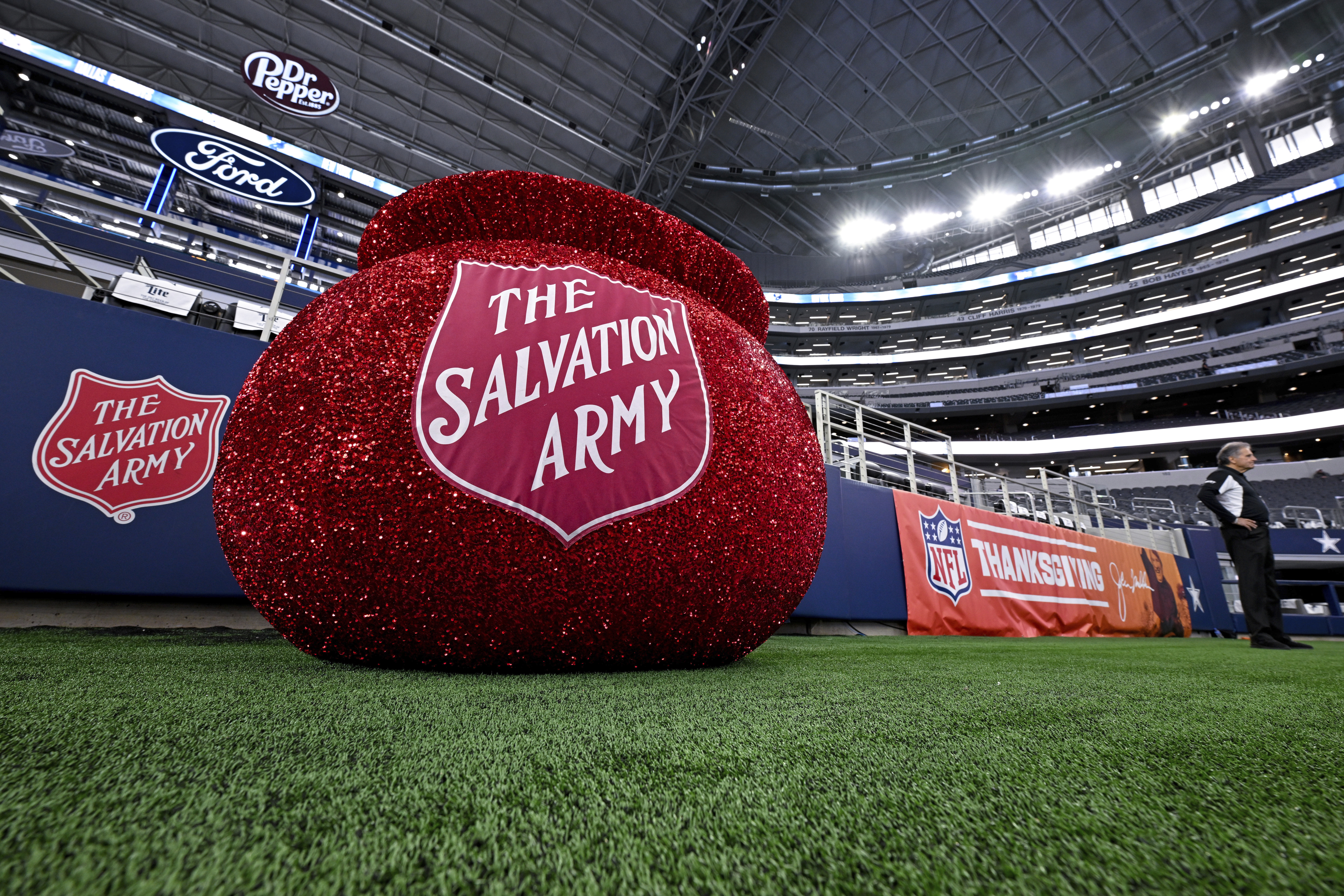  The Salvation Army bucket as seen on display before an NFL football game between the Dallas Cowboys and the New York Giants in Arlington, Texas, Nov. 28, 2024. 