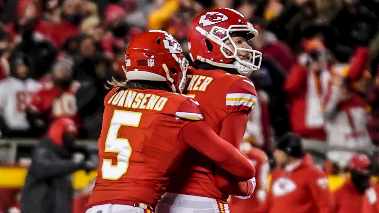 Kansas City Chiefs punter Tommy Townsend embraces place kicker Harrison Butker.