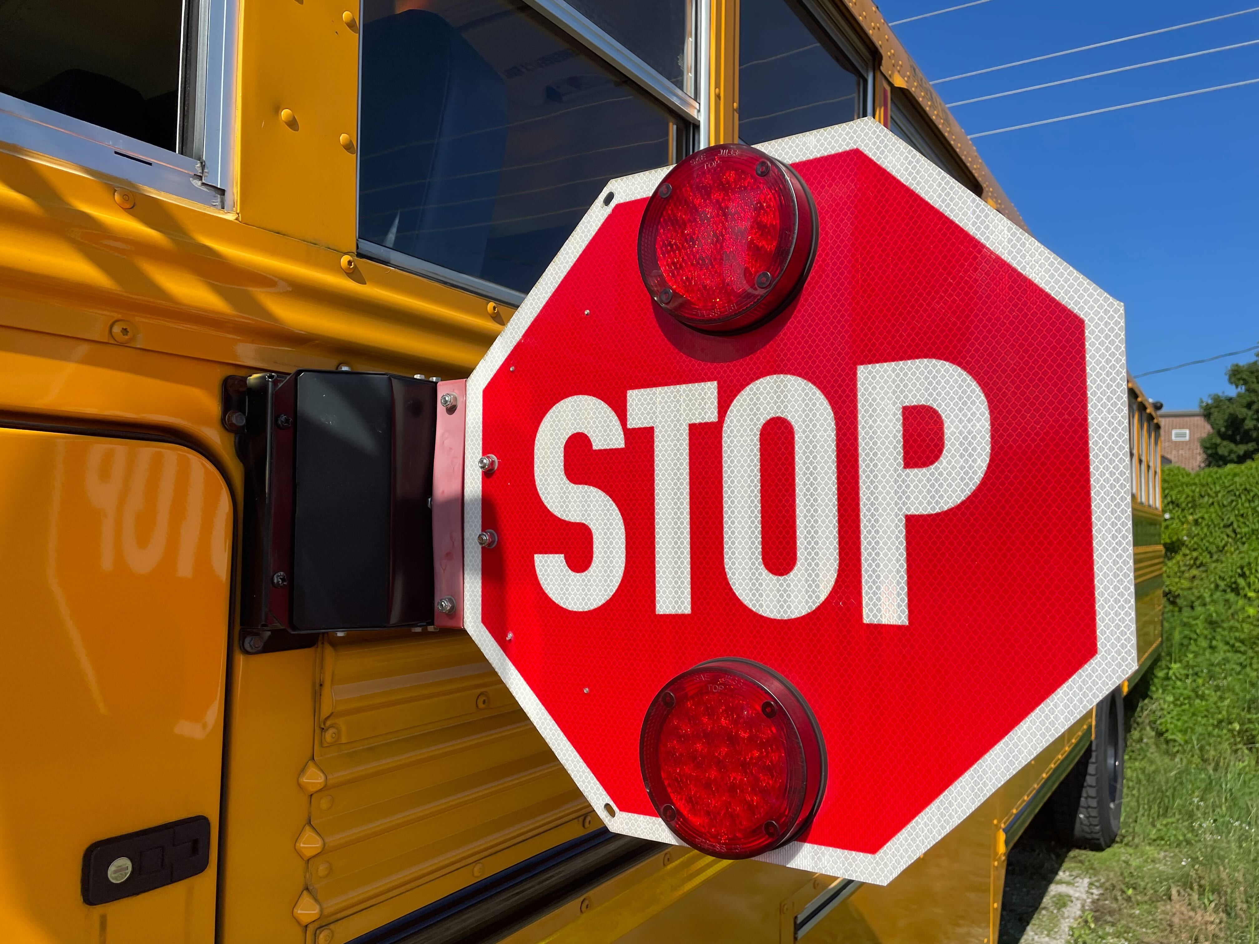 school bus stop sign