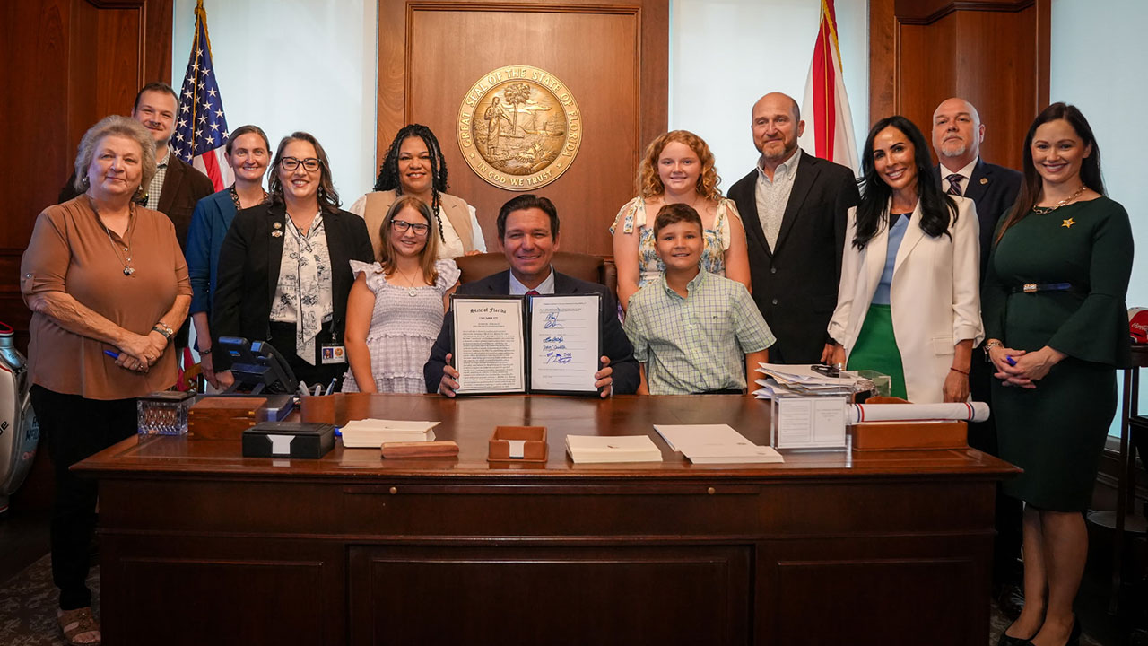Florida Gov. Ron DeSantis on May 21, 2026, signed a comprehensive domestic violence reform bill into law during a small gathering in his Tallahassee office on Thursday, capping a legislative effort that earned unanimous votes in both the Florida House and Senate.