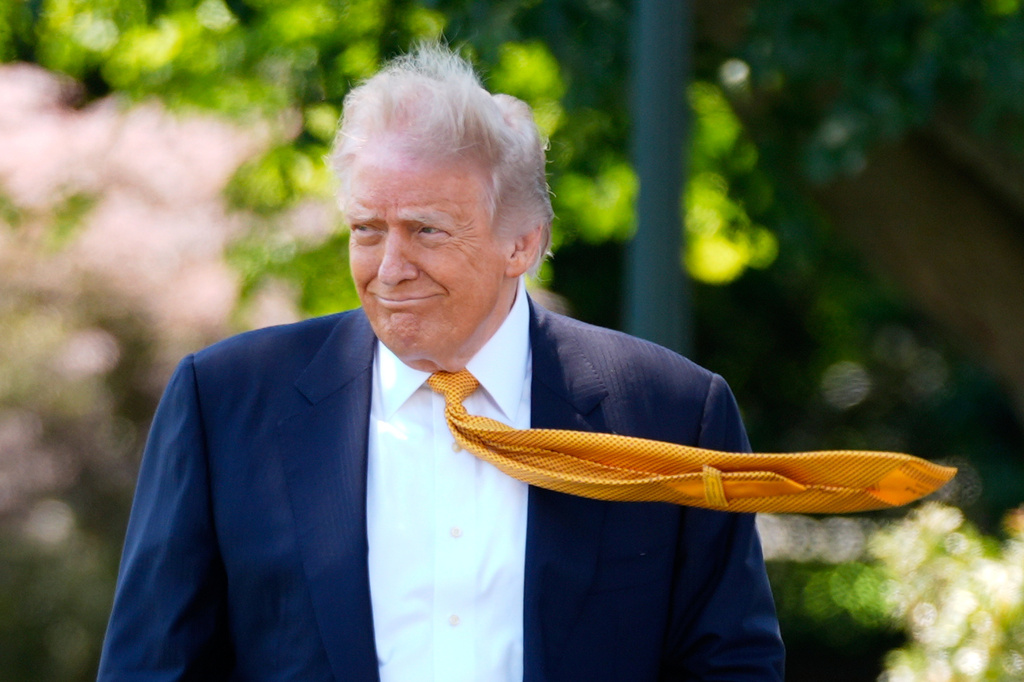 President Donald Trump walks as he leaves the White House for travel to Beijing, Tuesday, May 12, 2026, in Washington, to meet with China's President Xi Jinping. 