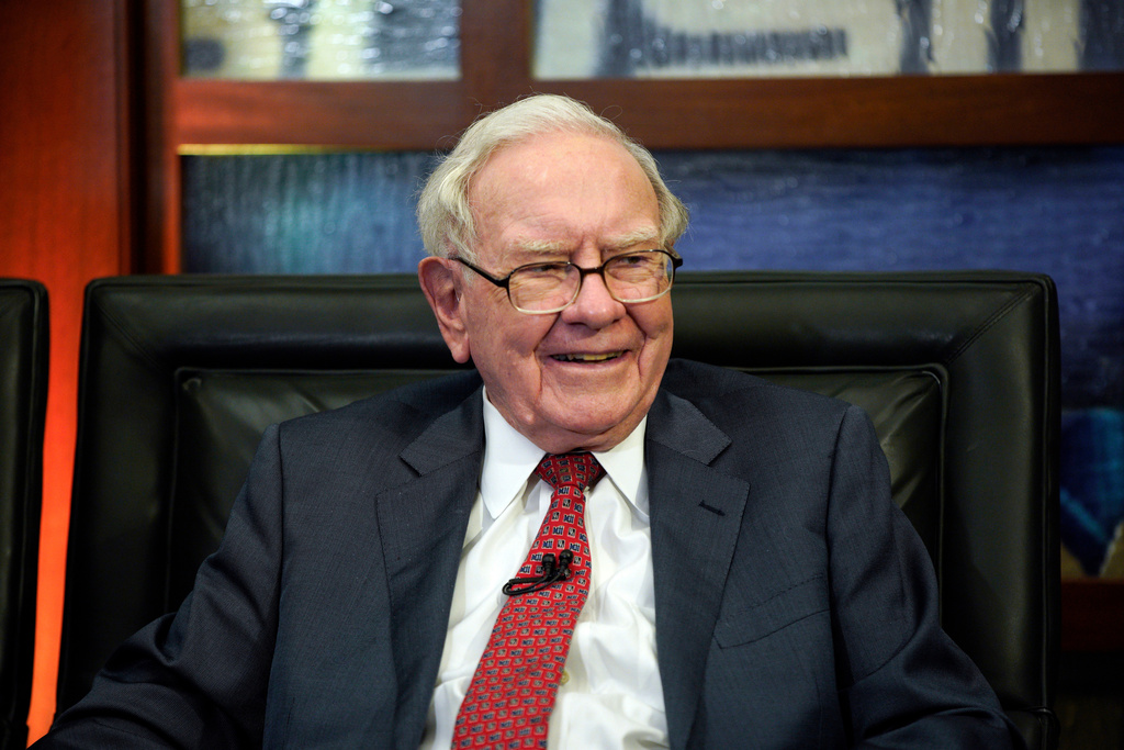 FILE- In this May 7, 2018, file photo, Berkshire Hathaway Chairman and CEO Warren Buffett smiles during an interview in Omaha, Neb..