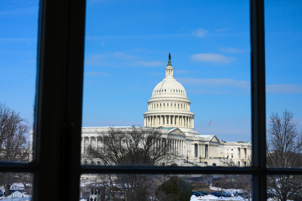 The US Capitol is visible through the Cannon House Office Building, Tuesday, Feb. 3, 2026, in Washington.