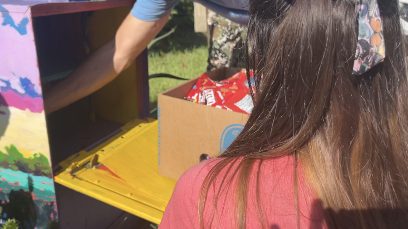 Ashley and Nathan Pugh filling one of the pantries 