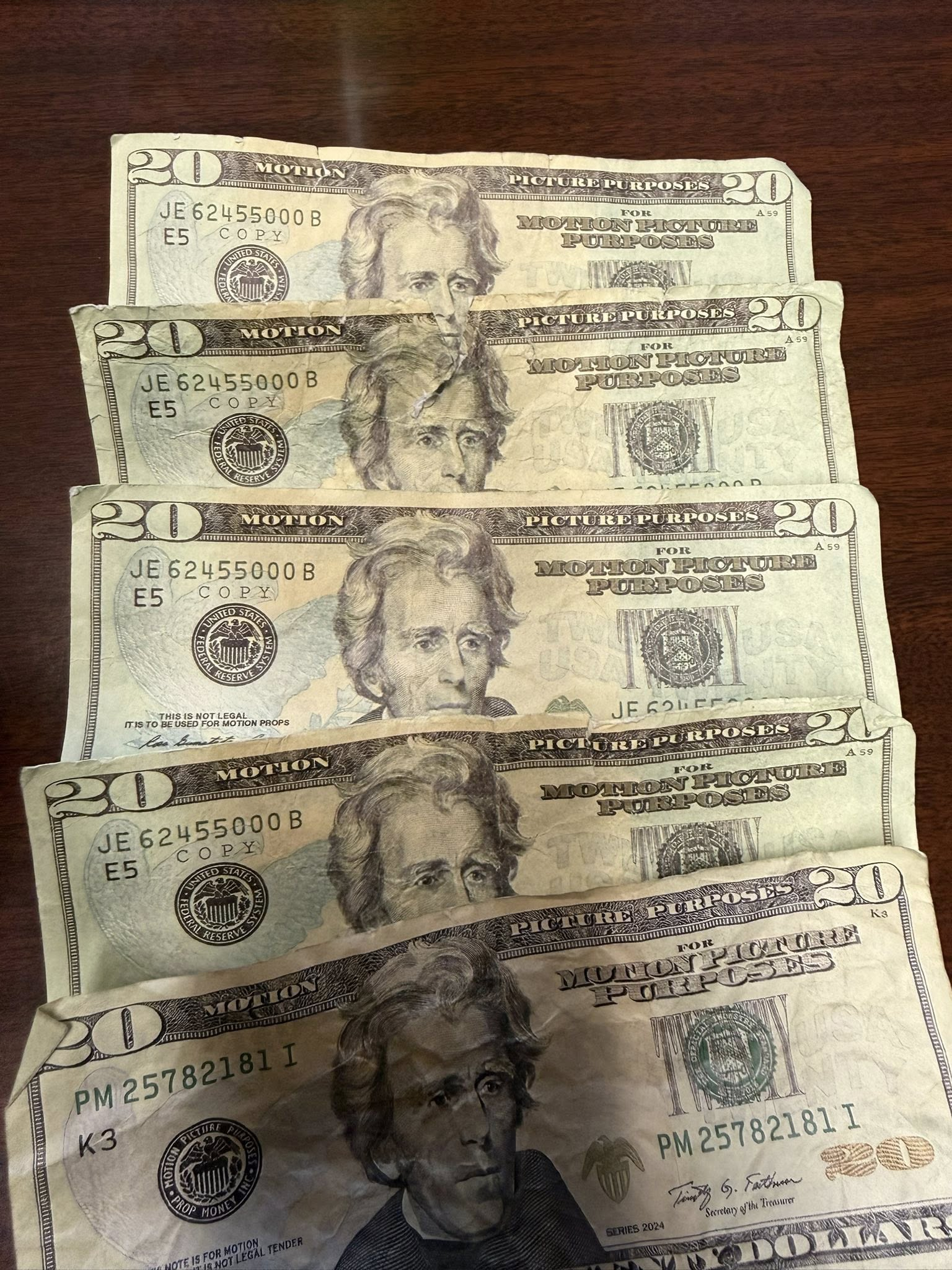 May be an image of money and text.png