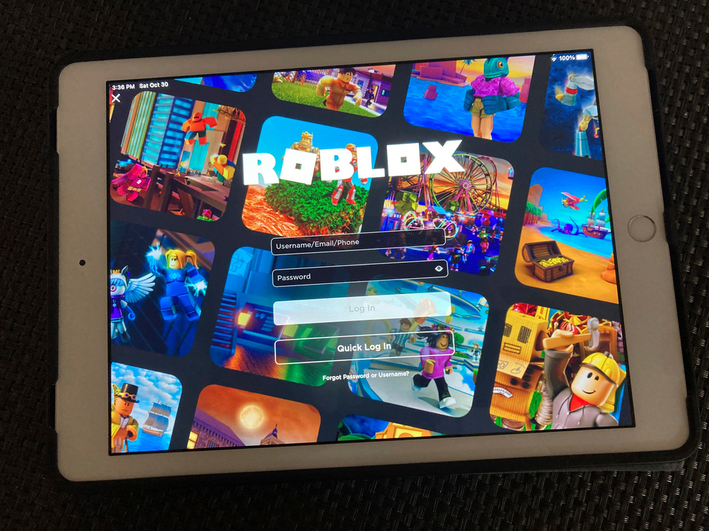 The gaming platform Roblox is displayed on a tablet.
