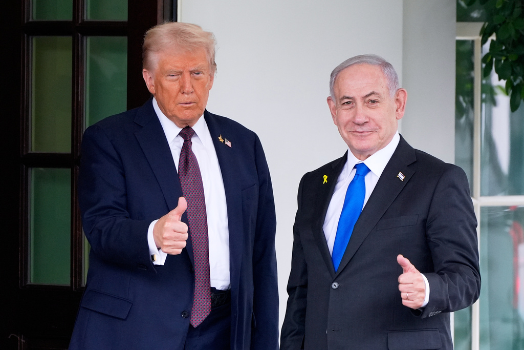 President Donald Trump greets Israeli Prime Minister Benjamin Netanyahu.