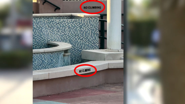 'No Climbing' signs at the fountain at Harbourside Place in Jupiter on Oct. 22, 2023.jpg