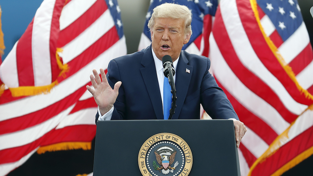 Trump shares parody news story on Twitter while railing against Biden, tech companies