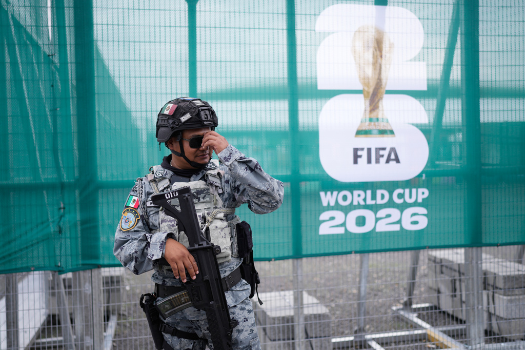 A National Guard officer  stands guard outside a stadium that will host FIFA World Cup matches in Guadalajara, Mexico, Tuesday, June 9, 2026. 