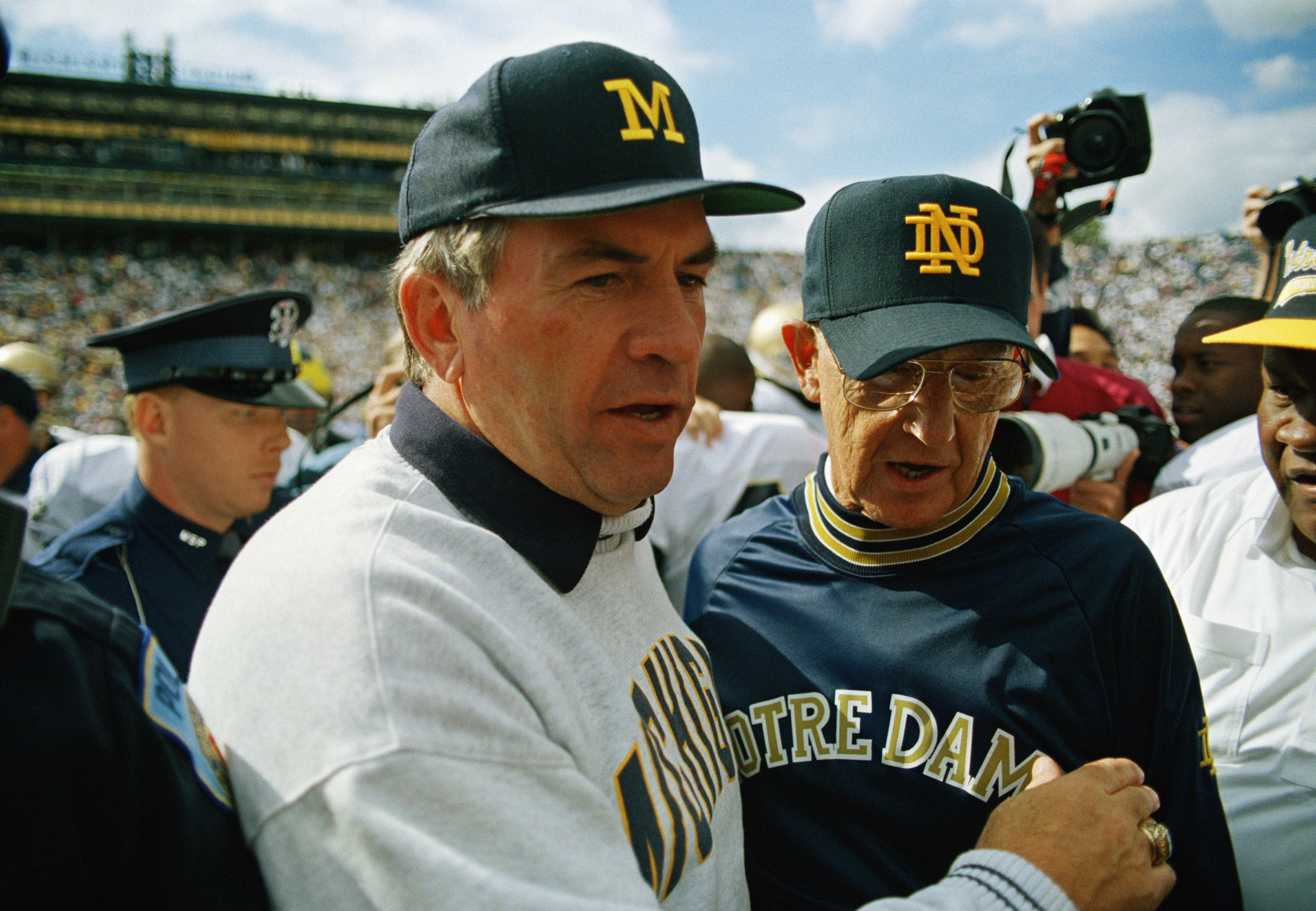 FILE Gary Moeller, Lou Holtz