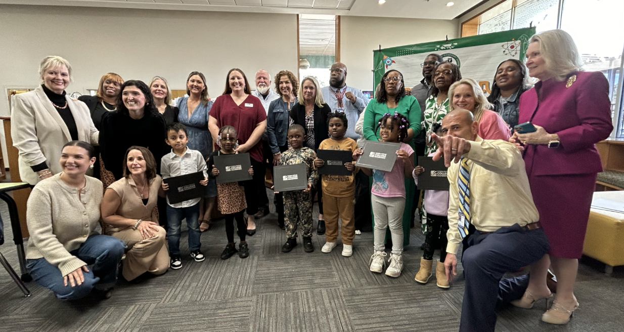 Riley Elementary students and donors celebrating the scholarships 