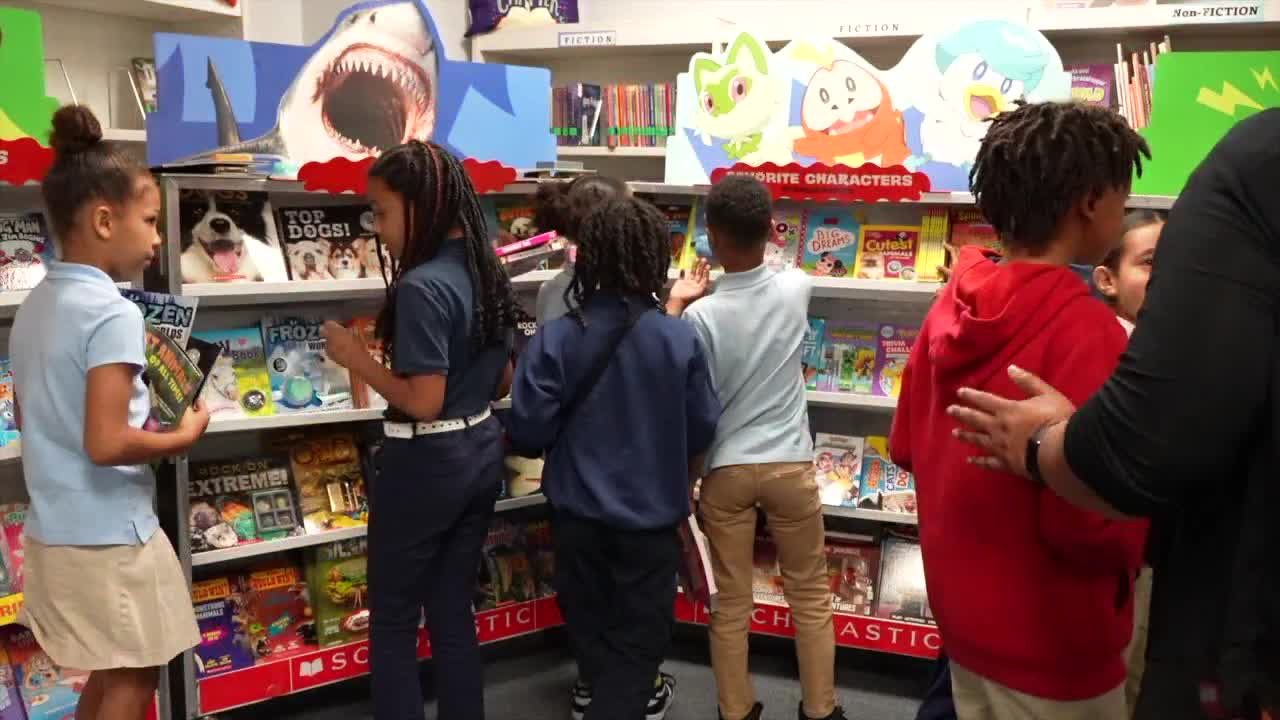 give a child a book.png