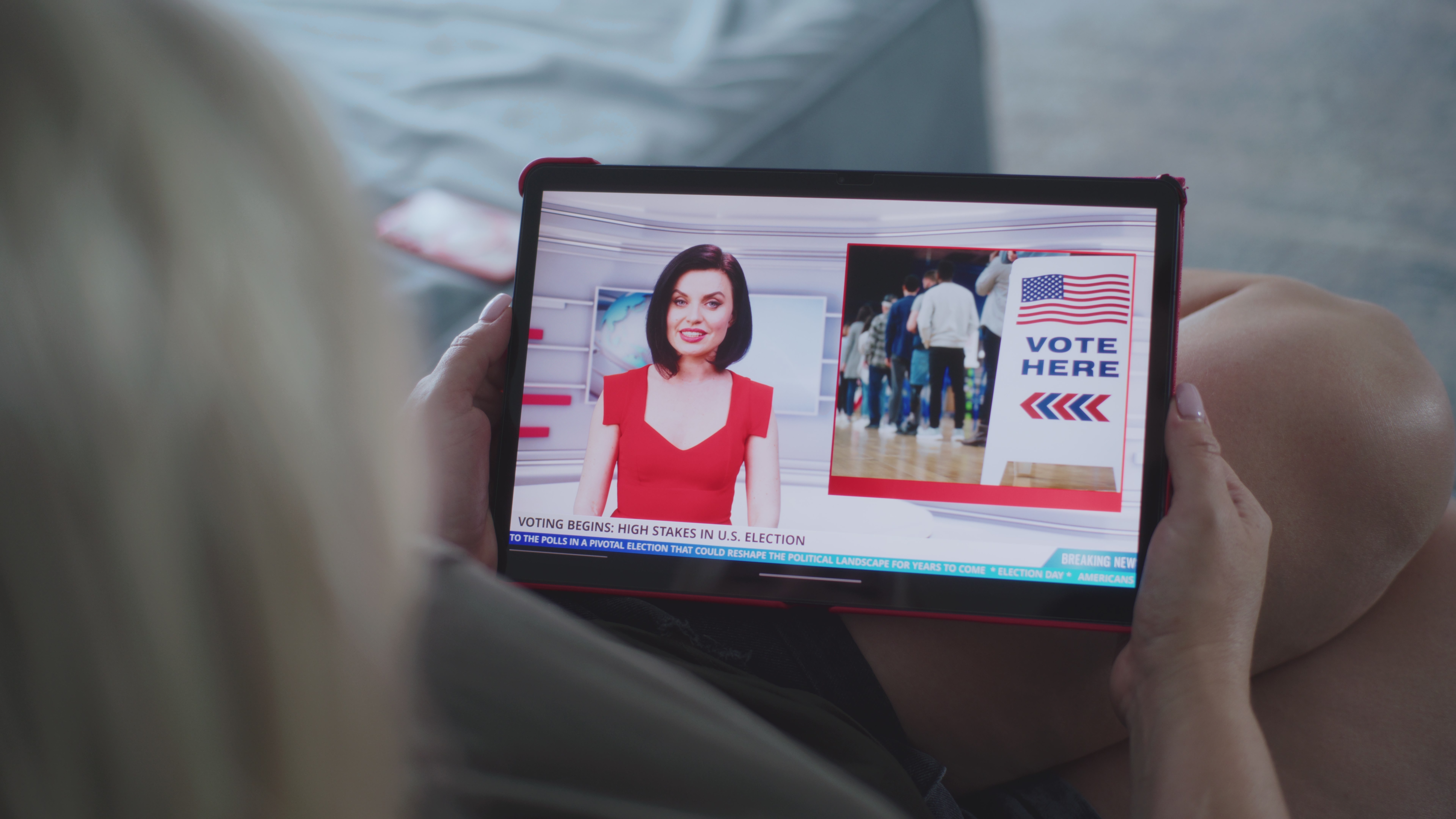 A person watching an election ad