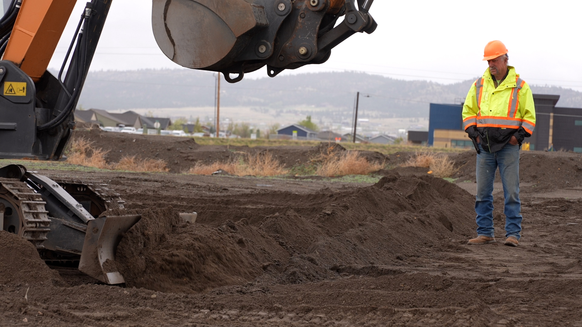 Man next to excavator