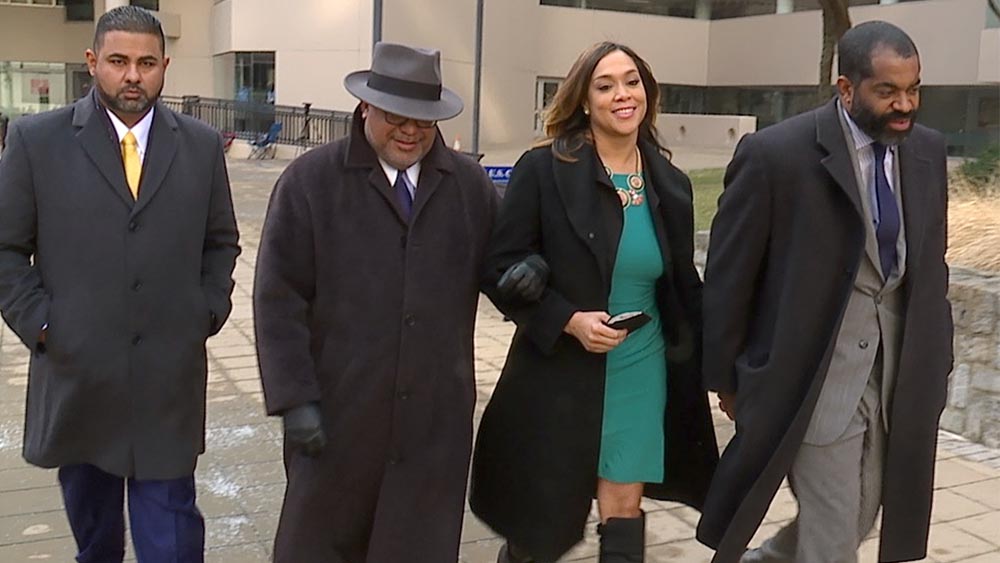 Feb. 2, 2021 - Marilyn Mosby walks out of the federal courthouse with her attorney, A. Scott Bolden, and husband, City Council President Nick Mosby.