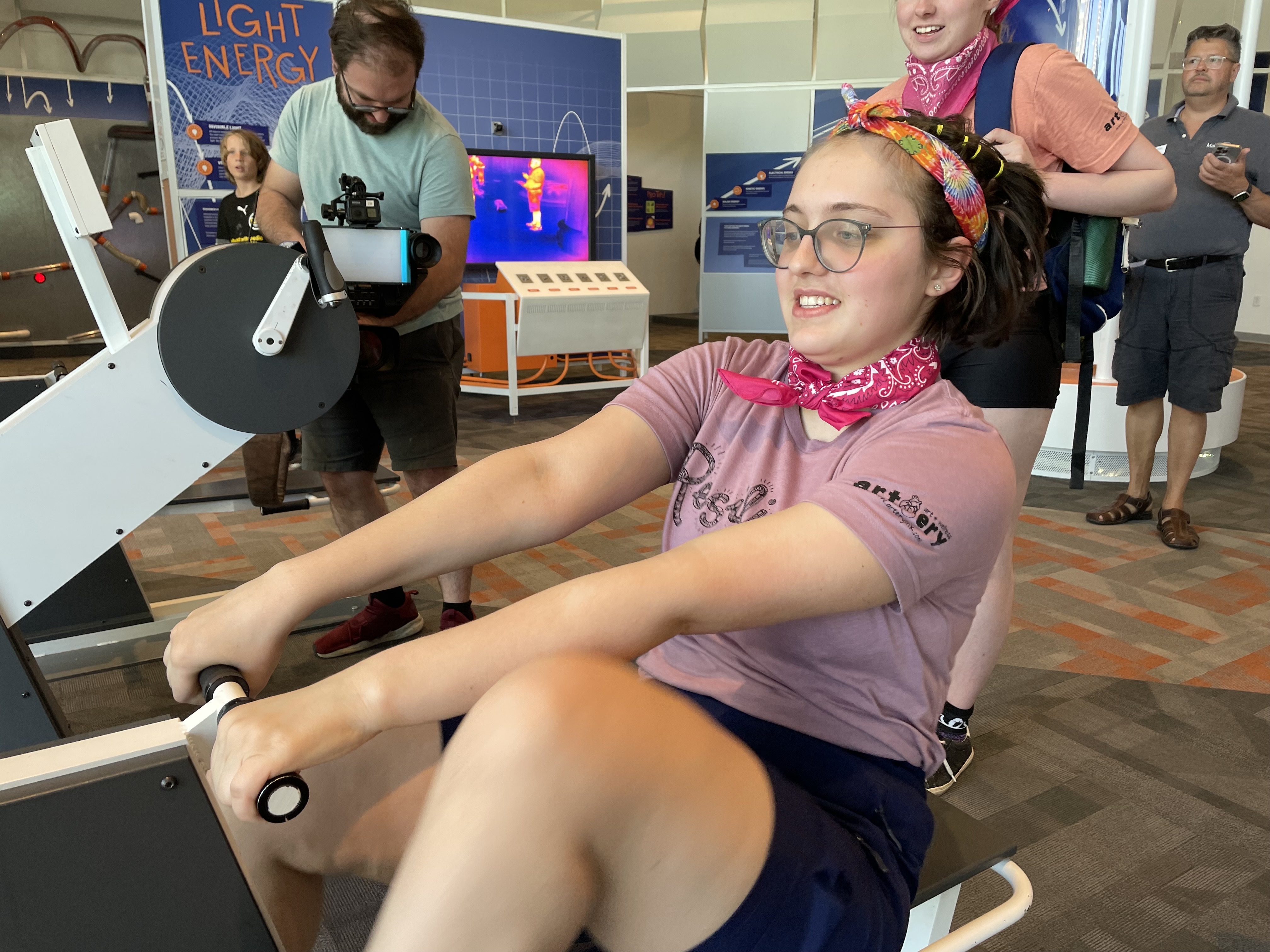 Theresa Reisel at Discovery World using stationary bike