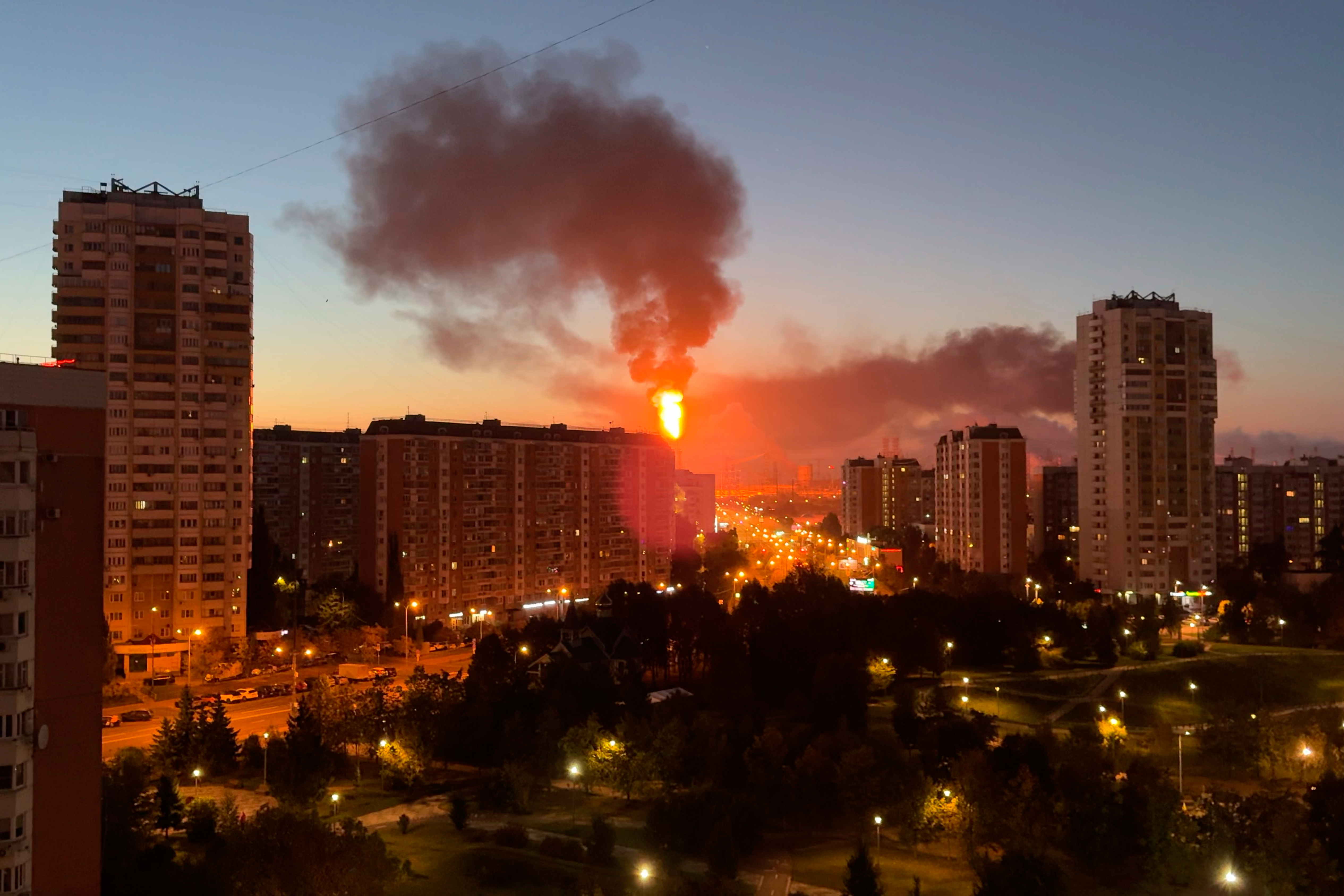 Flame and smoke is seen rising from Moscow's oil refinery in the south east of the city following a largescale Ukrainian drone attack, Sunday, Sept. 20, 2026.