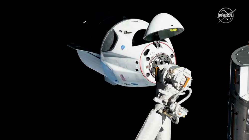 In this photo provided by NASA, the SpaceX Crew Dragon is pictured about 20 meters (66 feet) away from the International Space Station’s Harmony module, Sunday, March 3, 2019. SpaceX's new crew capsule arrived at the International Space Station on Sunday, acing its second milestone in just over a day. (NASA via AP)