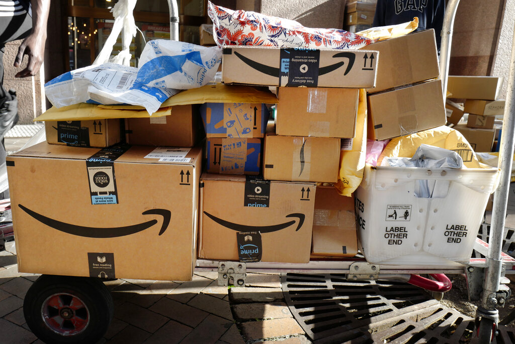 Amazon Prime boxes are loaded on a cart for delivery in New York.