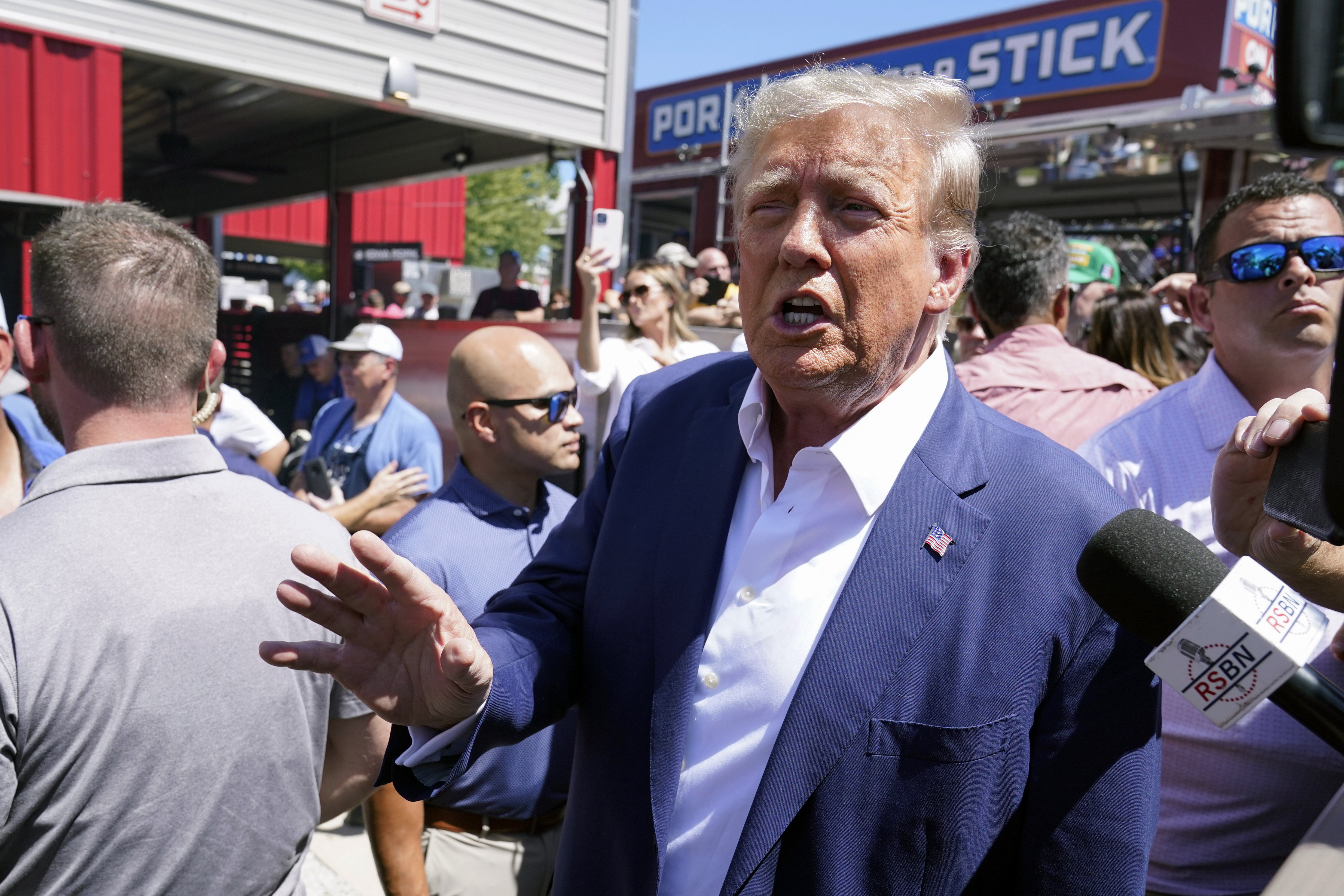 Former President Donald Trump speaks as he visits the Iowa State Fair on Aug. 12 in Des Moines, Iowa.