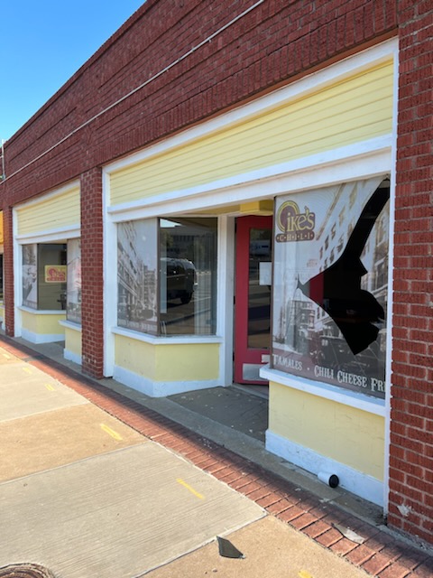 Broken window at Ike's Chili