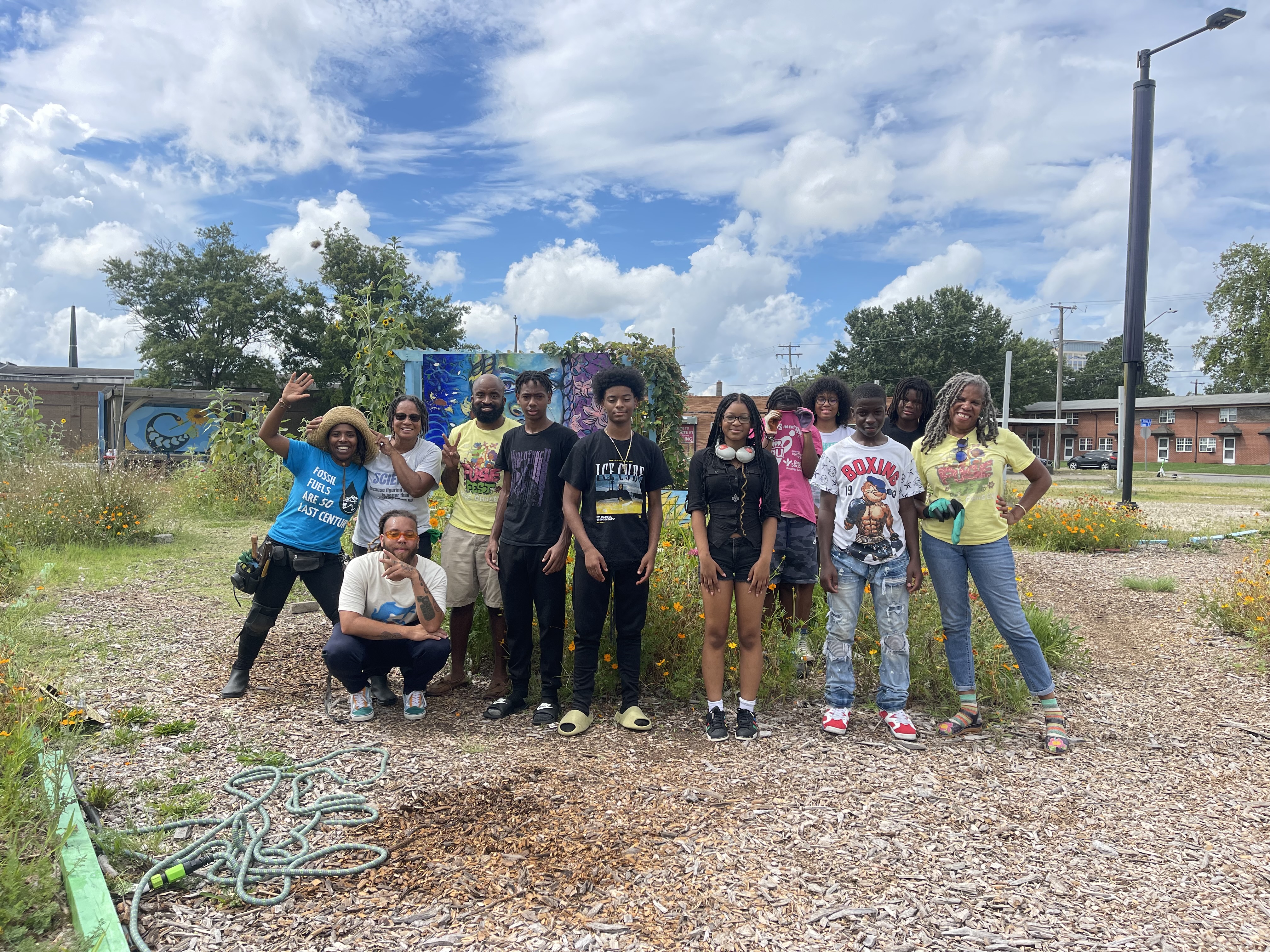 Volunteers grow and give fresh produce to community members