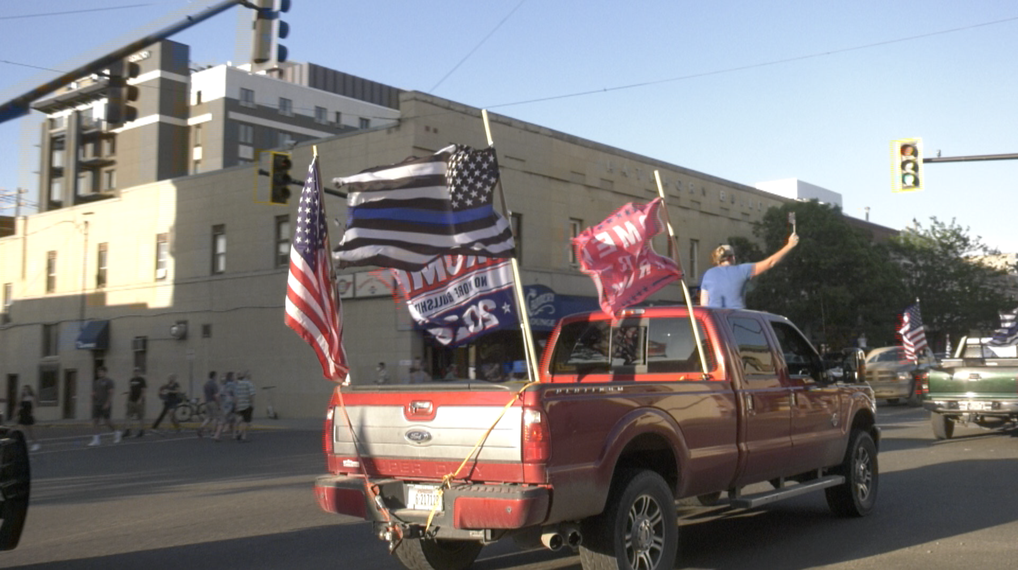 Hundreds of cars come through Bozeman for the Defend the Police Rally