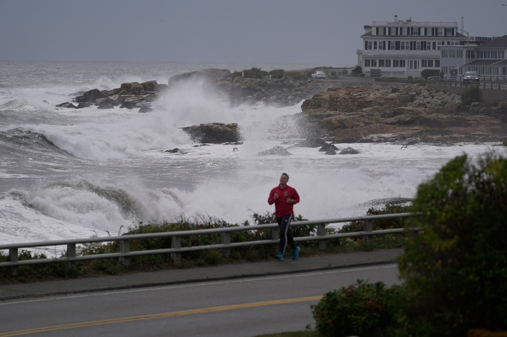 Surf breaks on the rocky coastline during the early stages of a nor'easter storm, Friday, Sept. 25, 2026, in Gloucester, Mass. 