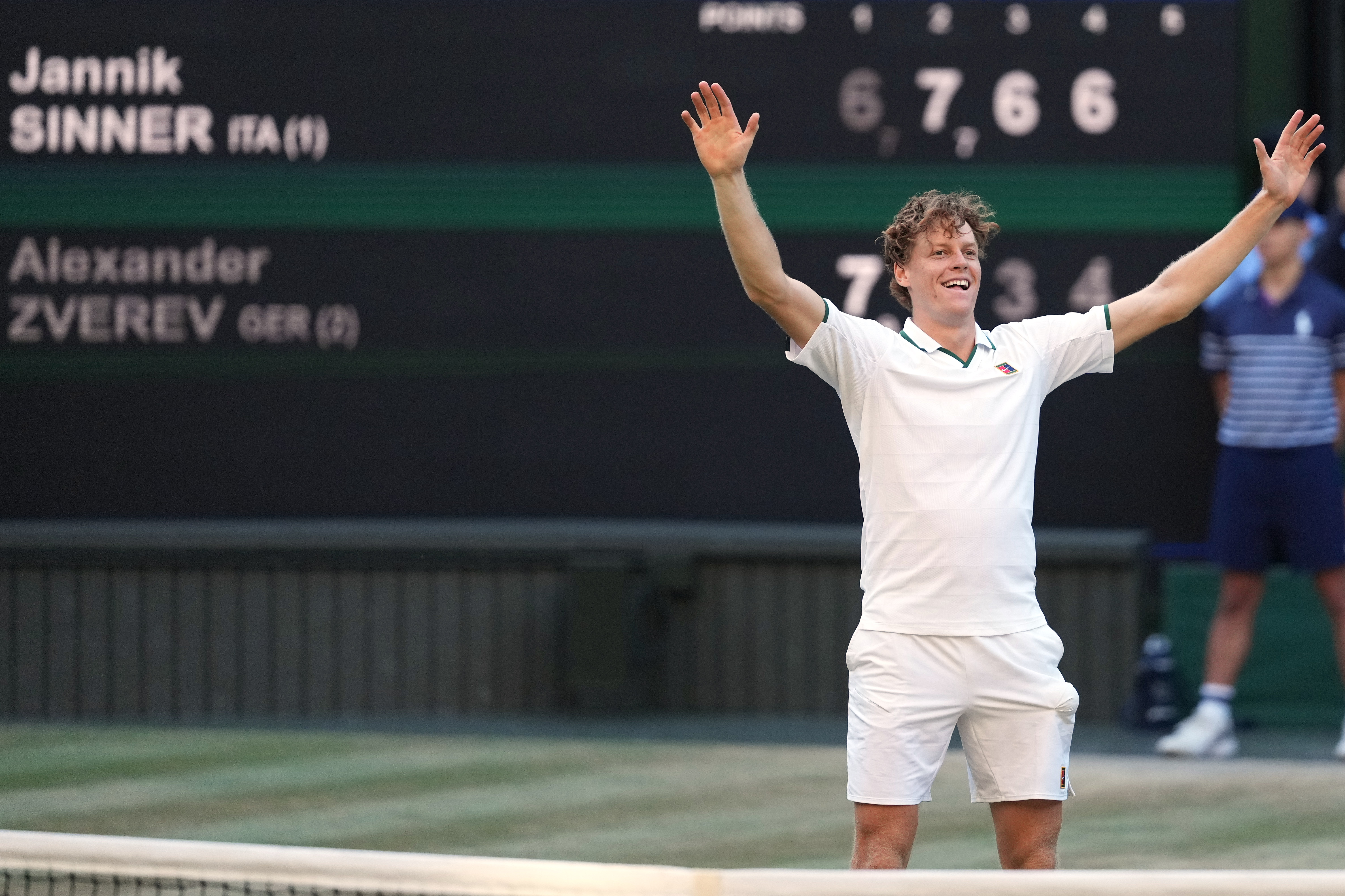 Jannik Sinner of Italy reacts to winning against Alexander Zverev of Germany in the men's singles final at Wimbledon Tennis Championships in London, Sunday, July 12, 2026.