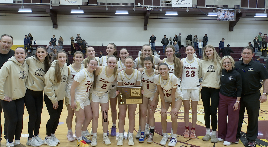 Florence Girls Basketball holds up Western B Divisional Trophy, Salish Kootenai College, Saturday March, 7 2026