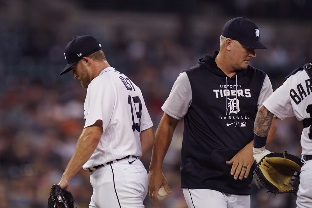 Detroit Tigers relief pitcher Will Vest is relieved by manager A.J. Hinch