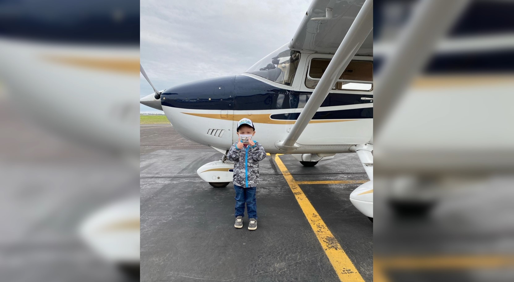 Tristan Voller poses with an Angel Flight West volunteer's plane