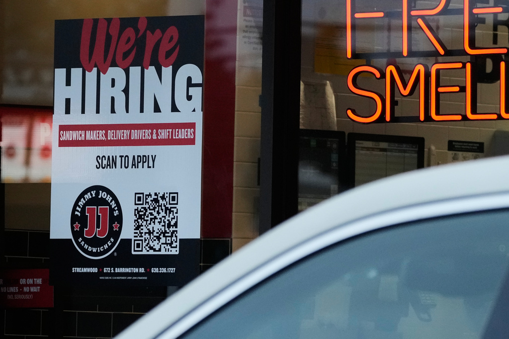 A hiring sign is displayed at a sandwich shop, in Streamwood, Ill., Wednesday, Sept. 16, 2026. 