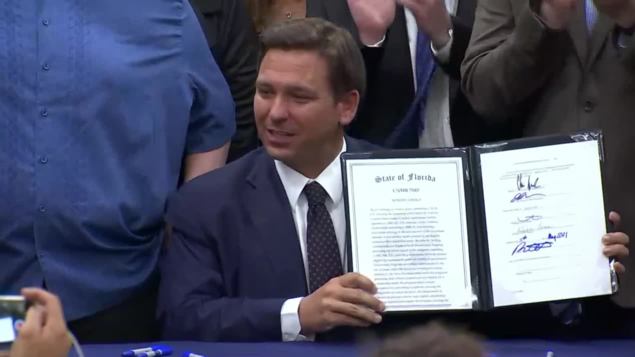 Florida Gov. Ron DeSantis signs HB 7045 at St. John the Apostle Catholic School in Hialeah on May 11, 2021.jpg