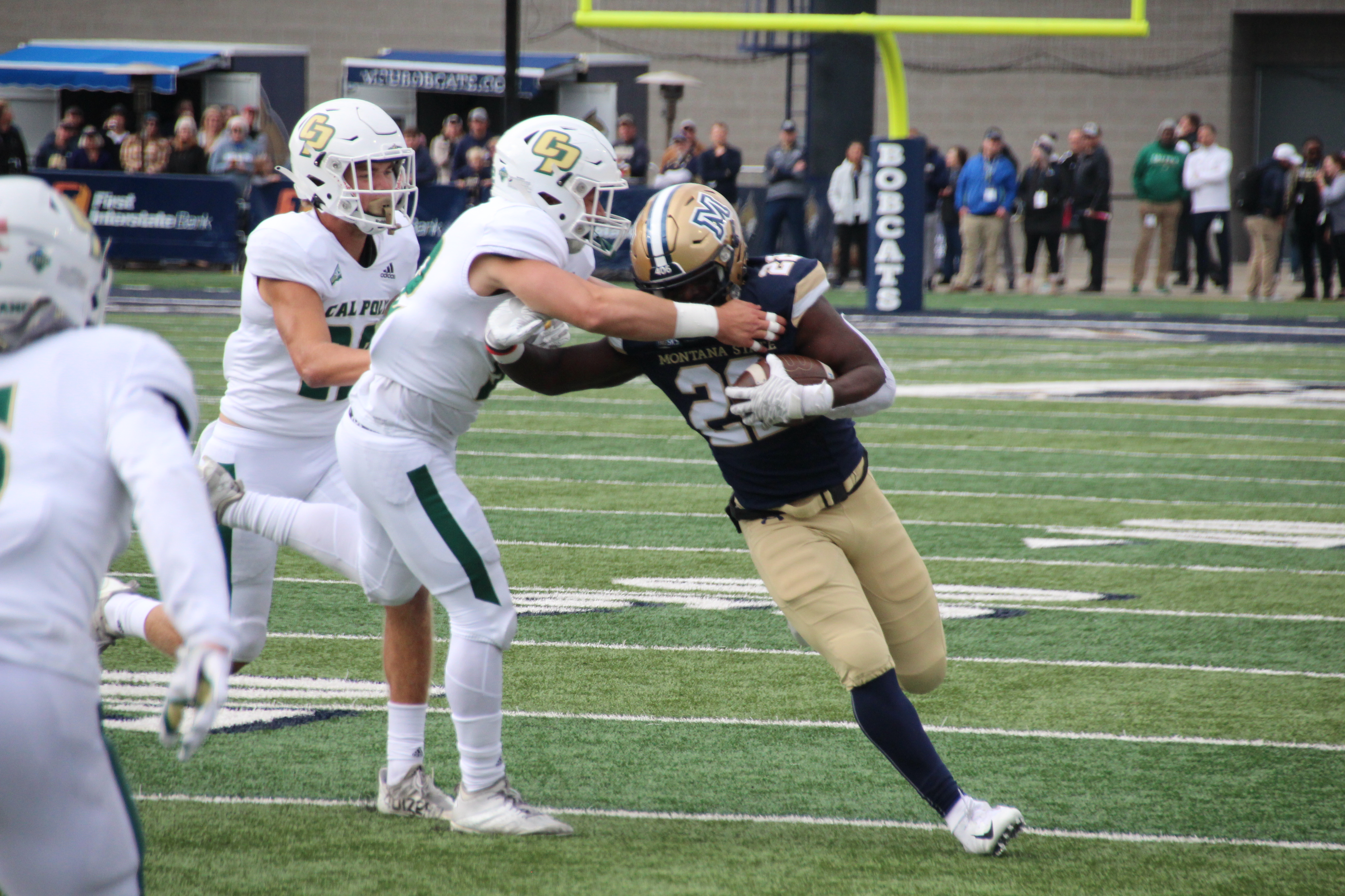 RB Isaiah Ifanse breaks a tackle in the first half