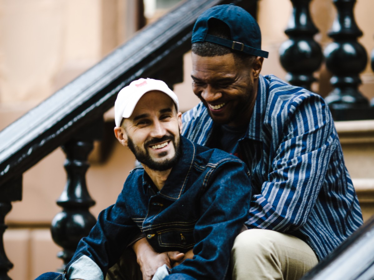 couple gay apartment house home happy men relationship