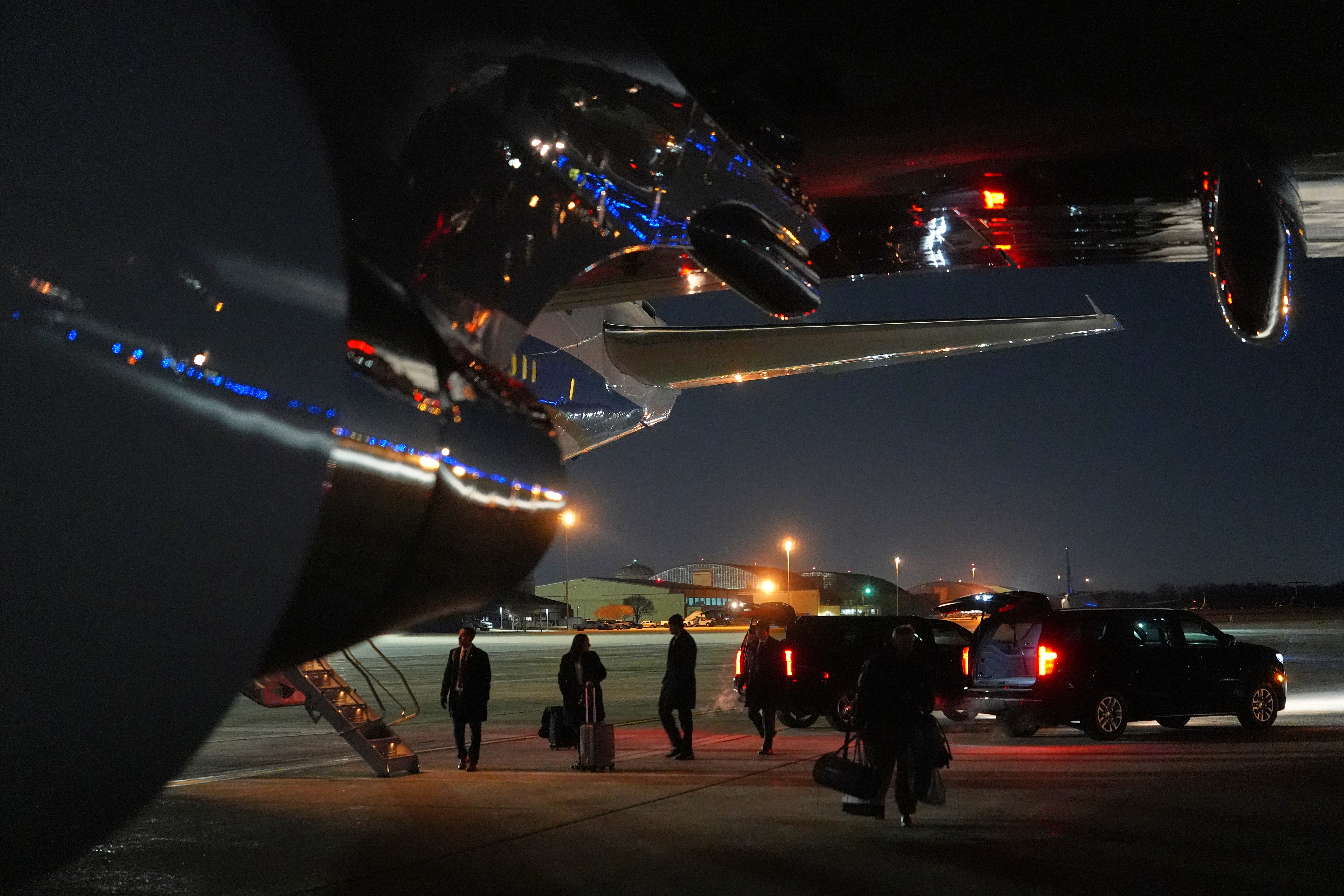 Things are unloaded from Air Force One after the plane, carrying President Donald Trump to the World Economic Form in Davos, experienced a minor electrical issue after departure, Tuesday, Jan. 20, 2026, and returned to Joint Base Andrews, Md. Trump will board a second plane to complete the trip.