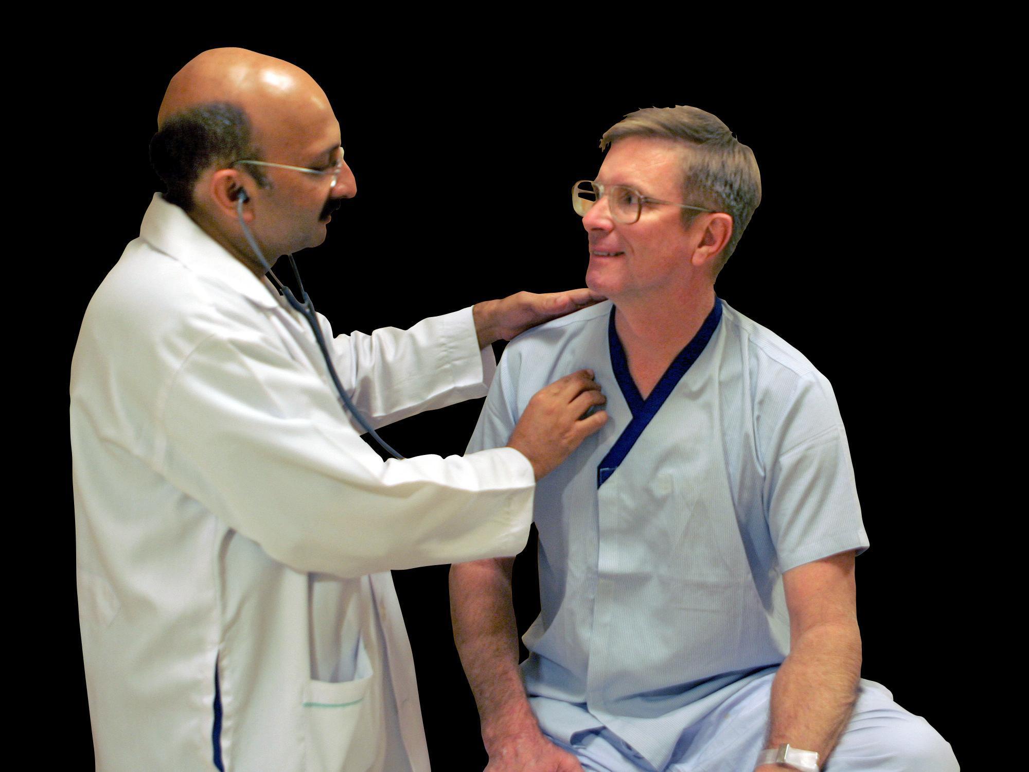 Doctor examines male patient