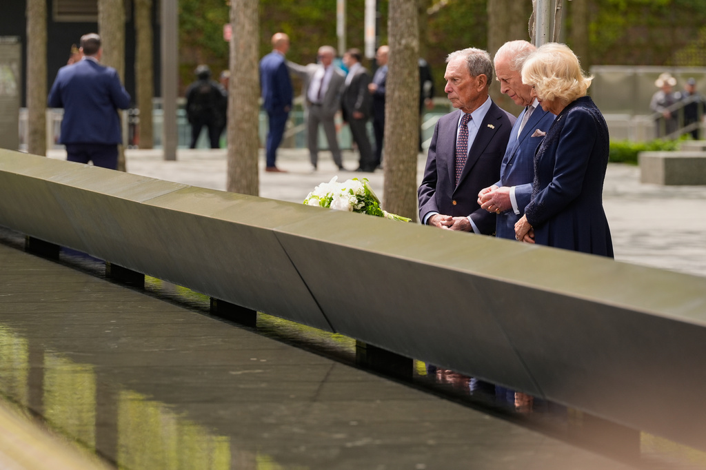 Former New York City mayor Michael Bloomberg, from left, Britain's King Charles III and Queen Camilla visit the 9/11 Memorial, Wednesday, April 29, 2026, in New York.