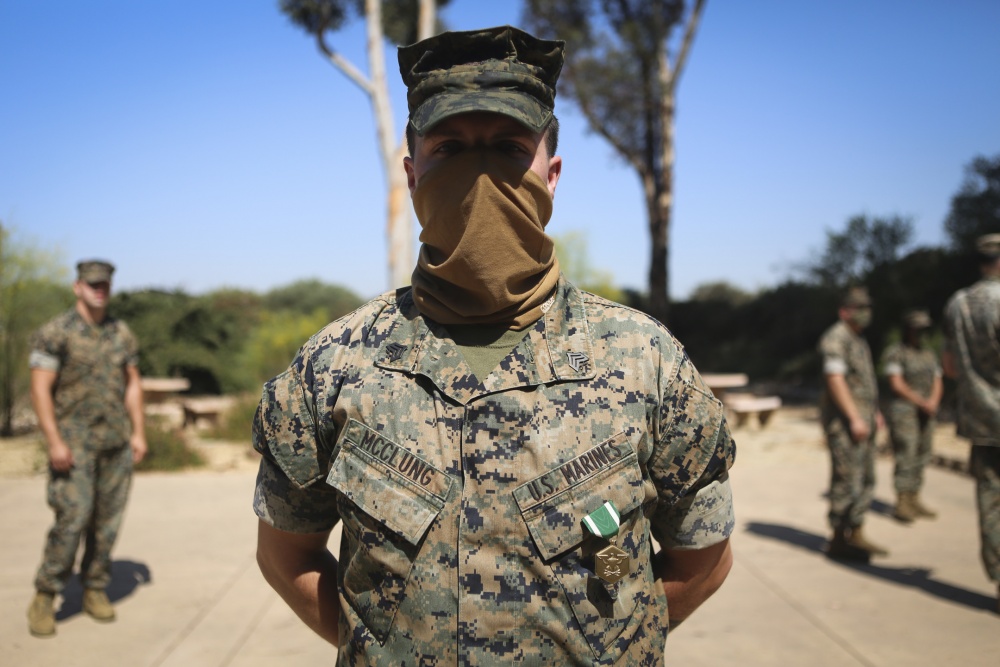 Marine honored for protecting neighborhood