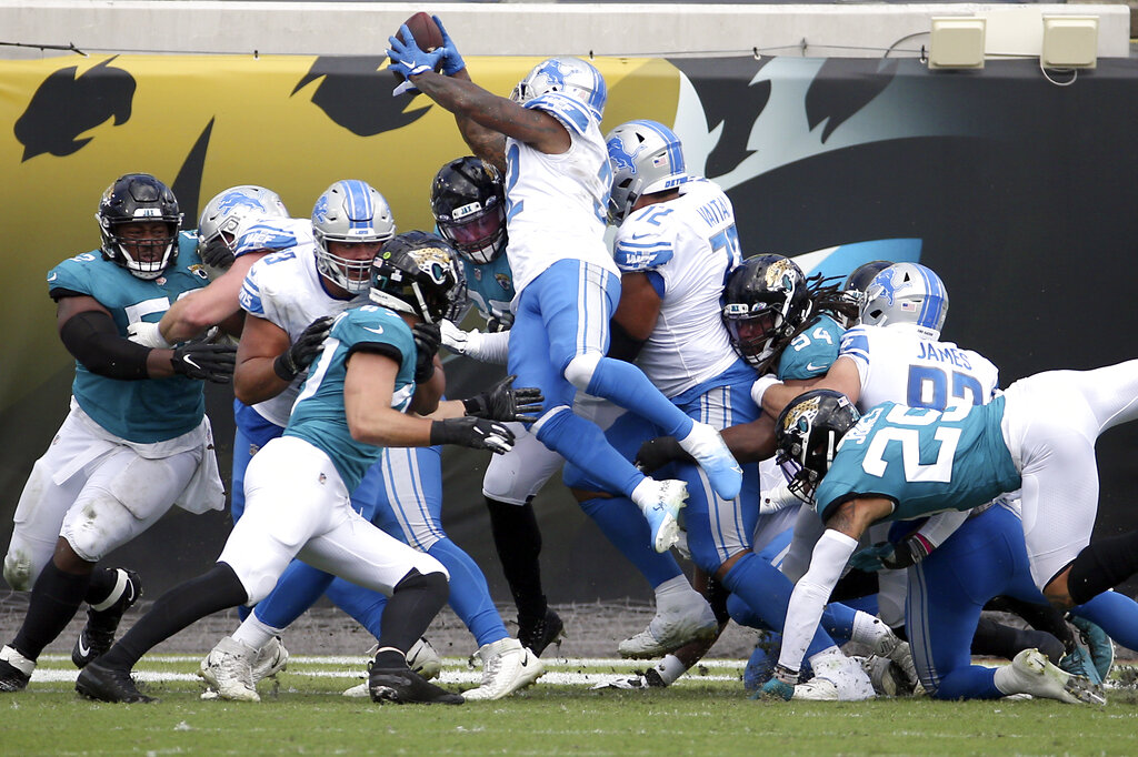DeAndre Swift rushes for 2 touchdowns in Lions win over Jaguars