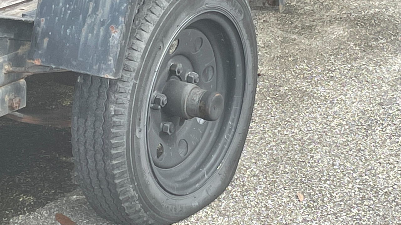 Person caught on surveillance video slashing tires in Seminole Heights.png